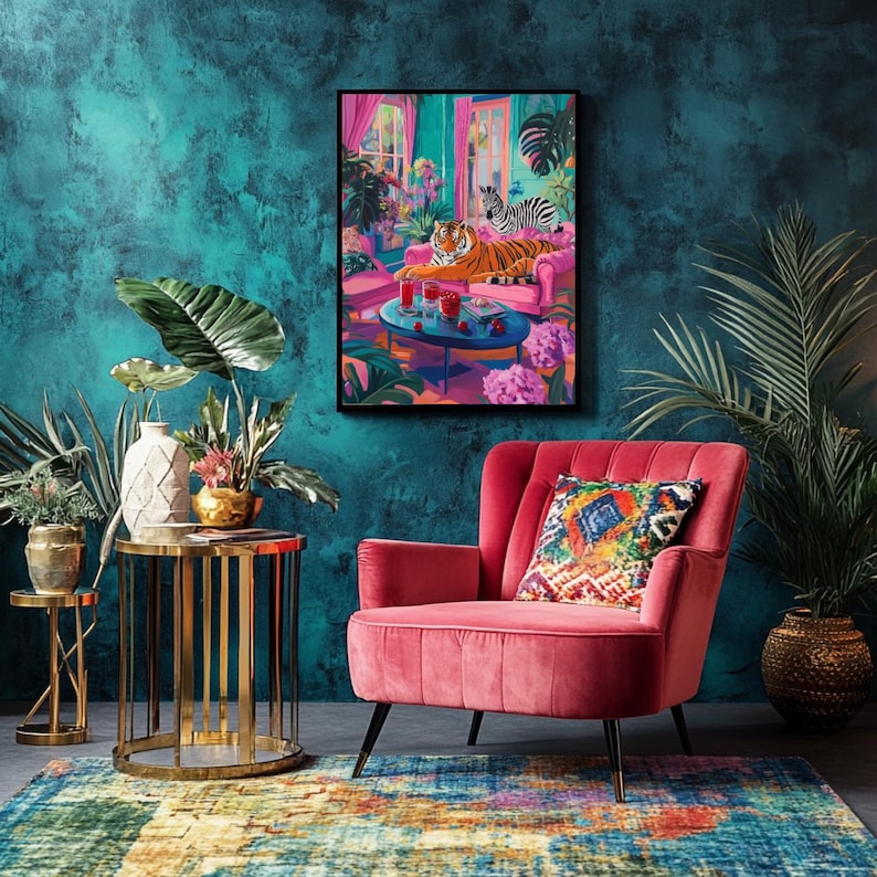 May include: A framed art print depicts a tiger and zebra lounging on a pink sofa in a vibrant, colorful room. The room features tropical plants, a blue coffee table with drinks, and a red armchair with a patterned pillow. The background is a teal wall.