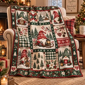 May include: A quilted throw blanket featuring a Christmas theme with multiple panels. The design includes illustrations of gnomes in red and green hats, pine trees, poinsettias, and berries. One gnome holds a sign that says Let it Snow.