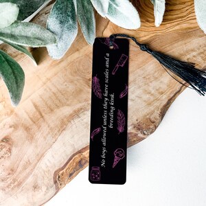 Scales and a Breeding kink metal bookmark is inspired by Butcher and Blackbird by Brynne Weaver