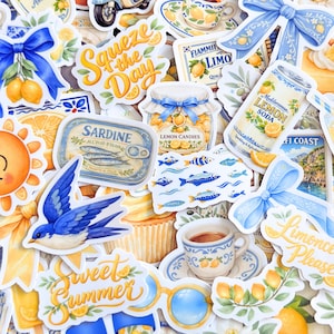 May include: A collection of assorted stickers featuring Mediterranean-themed illustrations including lemons, blue bows, a scooter, a sardine tin, a swallow, a sun, and various beverages with text such as Squeeze the Day and Limoncello Please.