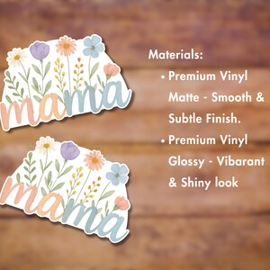 May include: Two vinyl stickers with the word "mama" in a pastel pink and blue font. The stickers are decorated with watercolor flowers in shades of pink, blue, and yellow. The stickers are available in matte and glossy finishes.