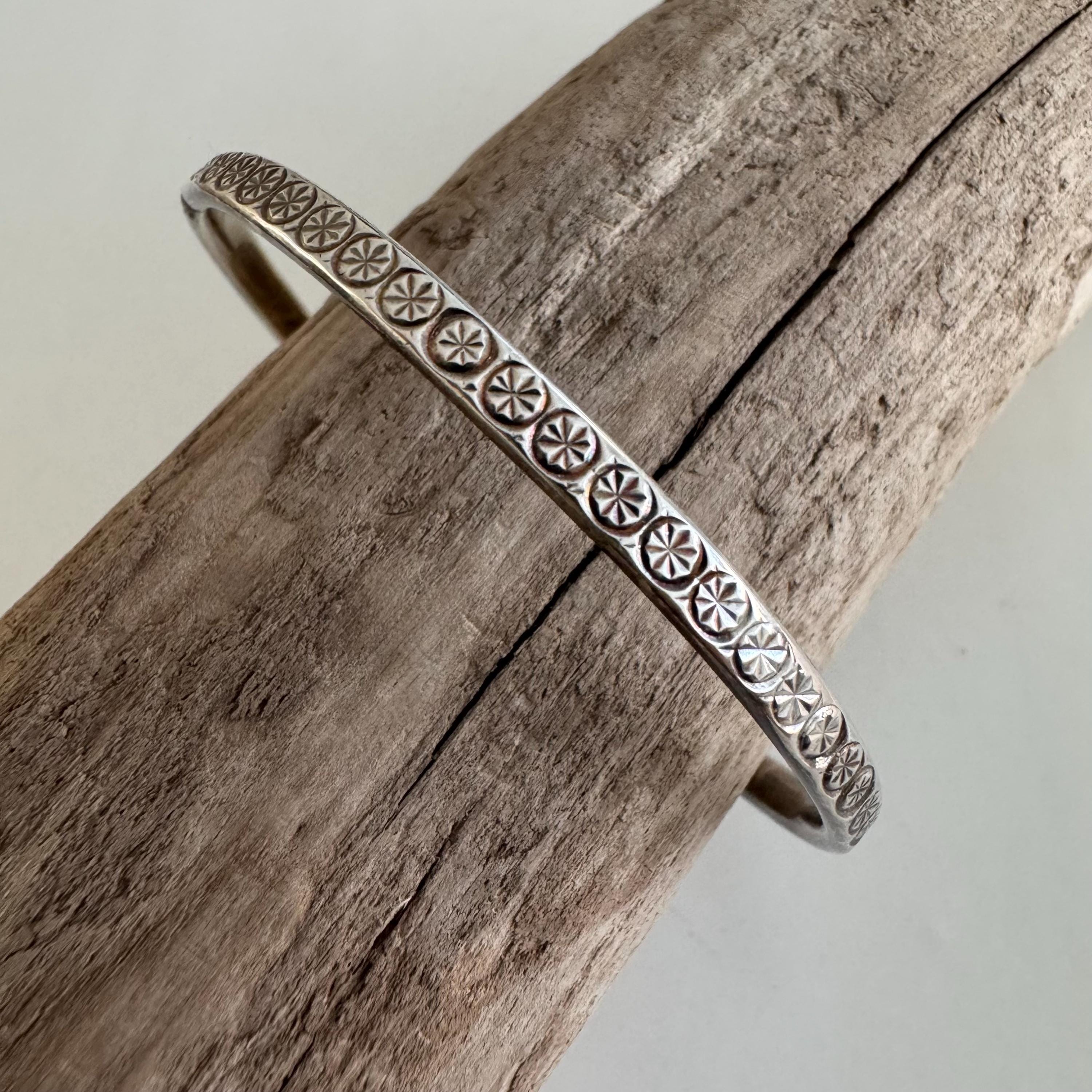 Fine Silver 990 Starburst Design Bangle Bracelet Symbolizing