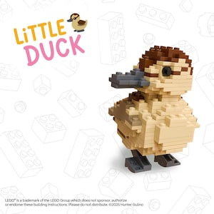 May include: A small duck figure constructed from interlocking plastic building bricks. The duck features a brown head, a tan body, and dark gray feet and beak. The text "LITTLE DUCK" appears in the upper left corner with a small duck icon.