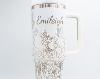 Butterfly and flowers laser-engraved 40oz Stainless Steel Insulated Tumbler with custom name.