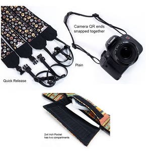 Puede incluir: Correa de c&aacute;mara negra con estampado de huellas de patas, hebillas de liberaci&oacute;n r&aacute;pida y un bolsillo de 5 x 10 cm con dos compartimentos. La correa est&aacute; conectada a una c&aacute;mara Canon. El texto dice "Camera QR ends snapped together".