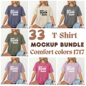 Puede incluir: Un paquete de maquetas de 33 camisetas en varios colores, incluyendo azul, marfil, gris, musgo, malva y rosa. Cada camiseta presenta el texto "your DESIGN here" en blanco. La imagen muestra una variedad de colores confort.