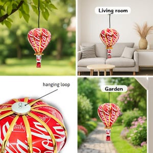 Puede incluir: Adorno colgante con forma de globo aerost&aacute;tico, hecho de latas de Coca-Cola recicladas. El globo es rojo y blanco con el logotipo de Coca-Cola. Se suspende con un cord&oacute;n negro y es adecuado para uso en interiores o exteriores.