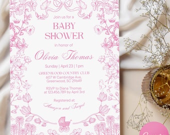May include: Pink floral baby shower invitation with a white background. The invitation includes the text "Join us for a Baby Shower in honor of Olivia Thomas" and details about the event, including the date, time, location, and RSVP information. The invitation also includes the text "Registered at: Amazon and Target".