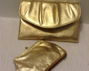 Vintage Gold Clutch Purse. Matching change purse with zip bottom compartment.