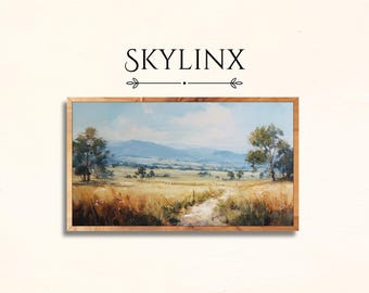May include: A framed landscape painting featuring a field of golden grass, a dirt path, and distant mountains under a blue sky. The artwork is in a wooden frame, with the word "SKYLINX" above the painting.
