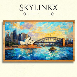 May include: An oil painting of Sydney, Australia, featuring the Sydney Opera House, Harbour Bridge, and city skyline. The artwork is framed in a light brown wooden frame. The sky is a mix of yellow, orange, and blue hues, reflecting on the water.