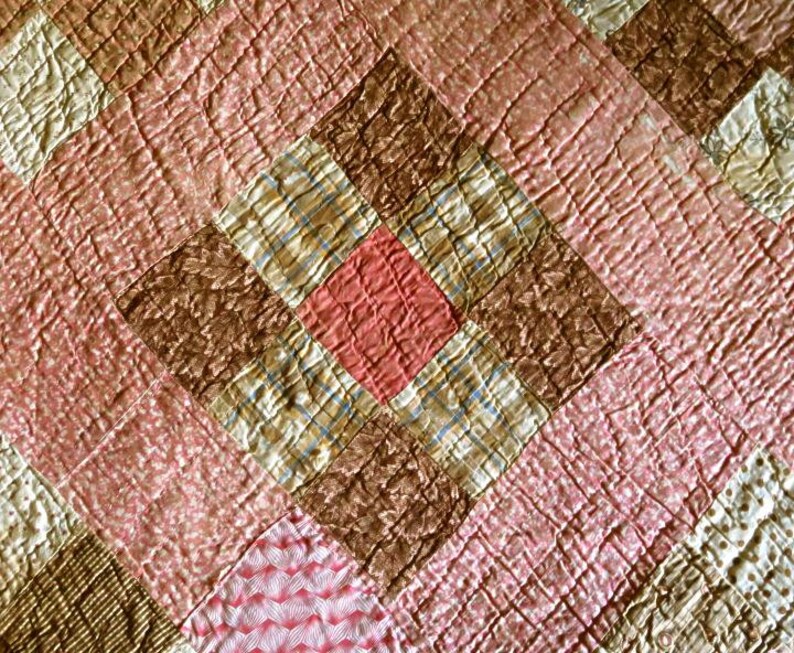 ANTIQUE PIECED QUILT 79x67,beige,peach,pink,brown,tan,coffee,vg condition,cotton,handsewn,9-square pattern,,polka dots,tiny flowers,stripes