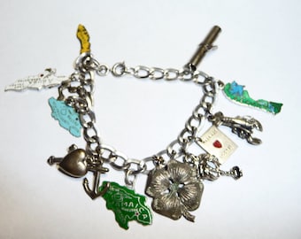 Vintage Sterling Silver Charm Bracelet and 14 Sterling Silver Charms on Etsy by APURPLEPALM