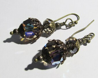 Elegant and Mysterious Swarovski Crystals and Fancy Brass Findings Dangle Drop Earrings on Etsy by APURPLEPALM