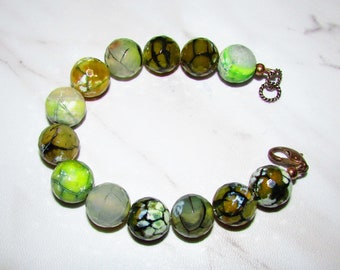 Earthy Green Faceted Rutilated Quartz Bracelet with Sterling Silver Dolphin Clasp OOAK on Etsy by APURPLEPALM