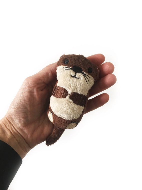 Loutre qui respire peluche loutre endormie peluche -  France