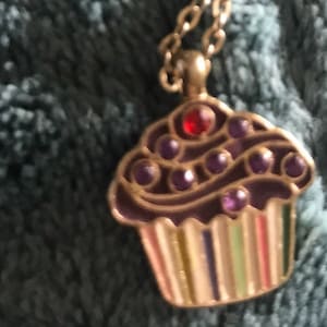 Chocolate frosting cupcake necklace gold tone cherry red and purple rhinestones enamel. image 1