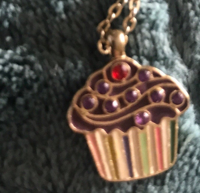 Chocolate frosting cupcake necklace gold tone cherry red and purple rhinestones enamel. image 1