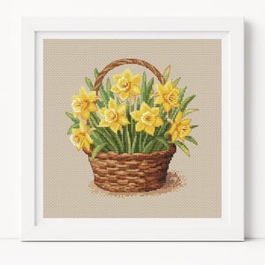 Lente narcissen kruissteekpatroon. Mand met borduursel gele bloemen pdf. Handwerkkaart met bloemen om direct te downloaden. Handgemaakt ontwerp