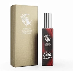 May include: A red and black bottle of perfume with a silver cap. The bottle has a white label with the text "Fantasy Community Perfumes" and "Cola Honey Shake".