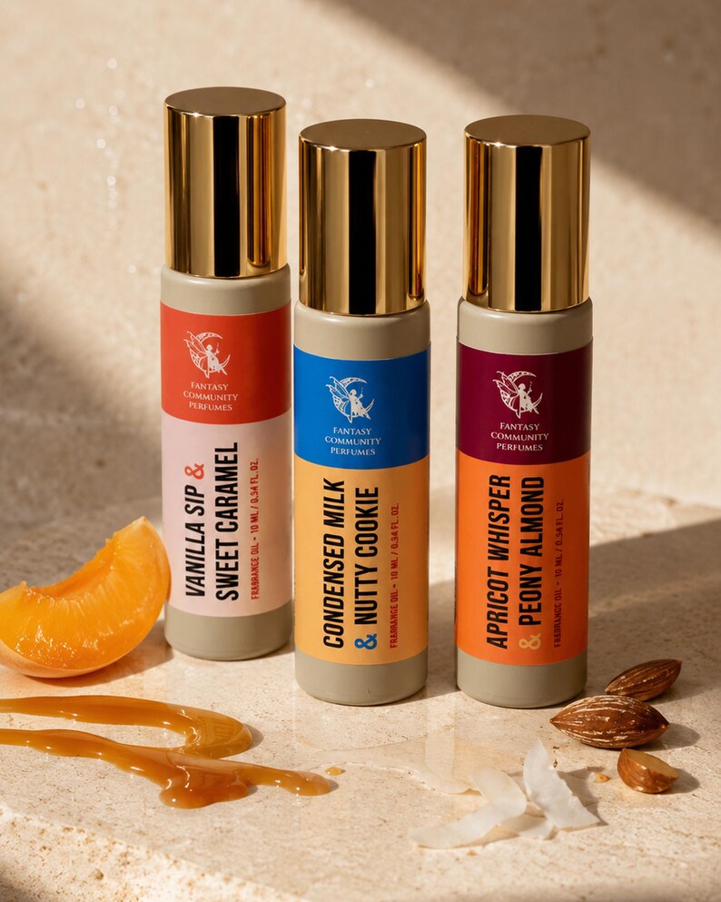 May include: Three perfume bottles with gold caps and colorful labels. The labels read "Vanilla Sip & Sweet Caramel", "Condensed Milk & Nutty Cookie", and "Apricot Whisper & Peony Almond". An apricot slice, caramel drizzle, and almonds are also present.