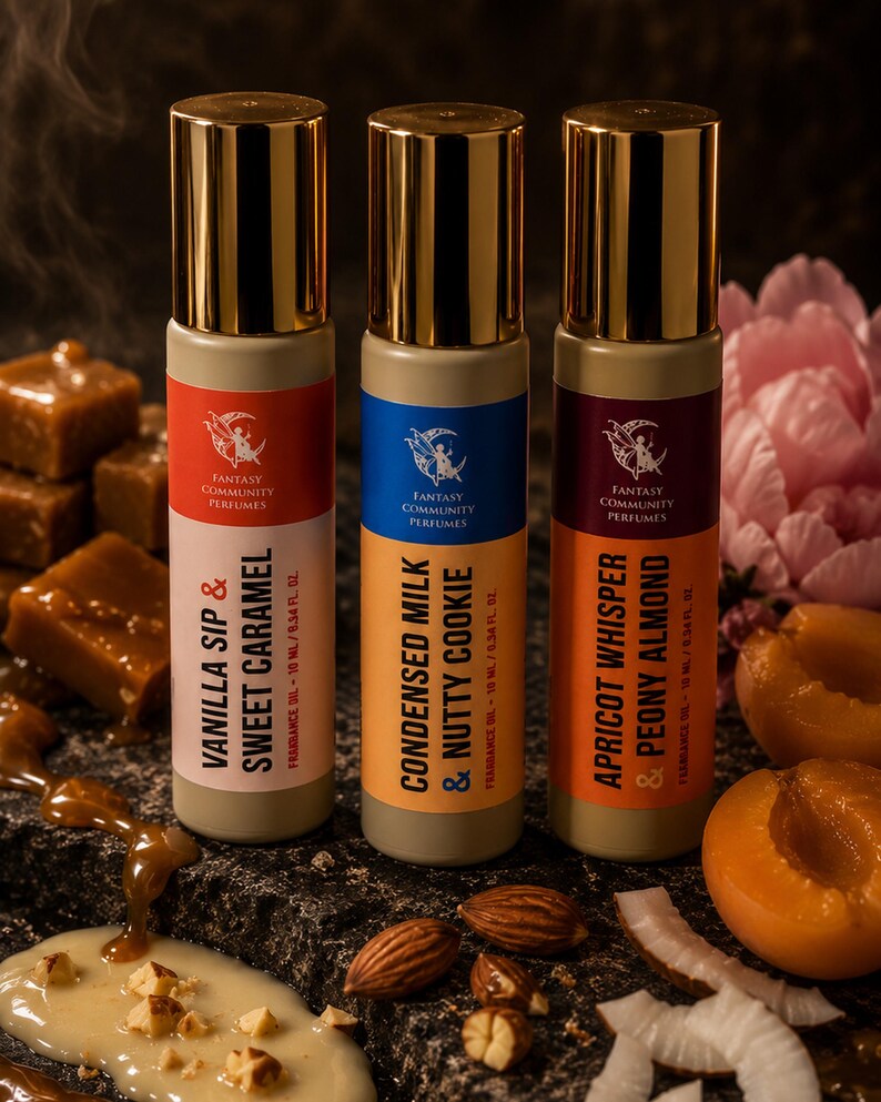 May include: Three perfume bottles with gold caps and colorful labels. The labels read "Vanilla Sip & Sweet Caramel", "Condensed Milk & Nutty Cookie", and "Apricot Whisper & Peony Almond". Each bottle contains 10 ml / 0.34 fl oz of fragrance oil.