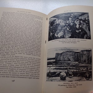 May include: An open book with two black and white illustrations. The top illustration is a painting of people on a bus. The bottom illustration is a painting of a coastal scene. Text on the page includes the title "The Battle of Life".