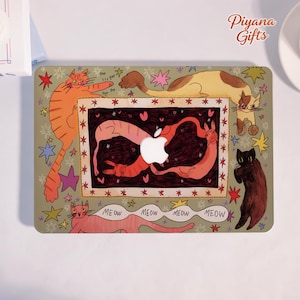 May include: A laptop case featuring a whimsical cat design. The case has a light green background with illustrations of cats in various poses, surrounded by stars and hearts. The word "MEOW" is written in a speech bubble. The Apple logo is visible.