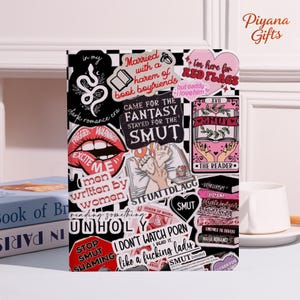 May include: A black and white sticker collage with various text and graphic designs. The stickers include phrases like "Came for the Fantasy, Stayed for the Smut" and "I'm here for Red Flags". The collage is on a white background.