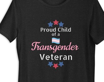 トランスジェンダー退役軍人の誇り高き子供 ピンク文字 MtF ユニセックス T シャツ