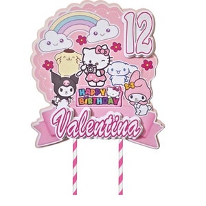May include: A pink and white cake topper with cartoon characters, a rainbow, and the number 12. The topper has the words "Happy Birthday Valentina" written on it. Two pink and white striped sticks support the topper.