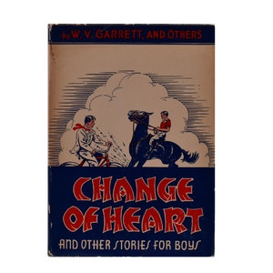 Puede incluir: Una portada de libro vintage con una ilustración azul y roja de un niño a caballo y otro niño en bicicleta. El título del libro es "Change of Heart" y el subtítulo es "And Other Stories for Boys".