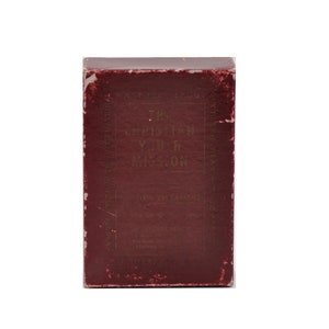 May include: A burgundy box with gold lettering that reads "The Mystery of the Missing Will" and "How You Can Solve It". The box is for a board game.