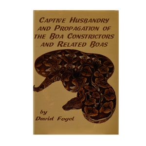 May include: Book cover with a brown snake on a tan background. The title is "Captive Husbandry and Propagation of the Boa Constrictors and Related Boas" by David Fogel.