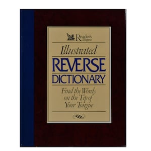 Puede incluir: Un libro de color burdeos y azul con el título "Illustrated Reverse Dictionary" y el texto "Find the Words on the Tip of Your Tongue" en la portada. El libro está publicado por Reader's Digest.
