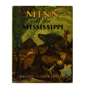 May include: Book cover with a green and brown illustration of a turtle and other animals. The title is "Minn of the Mississippi" by Holling Clancy Holling.