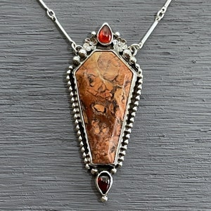 tiffany stone coffin pendant with garnet gemstones