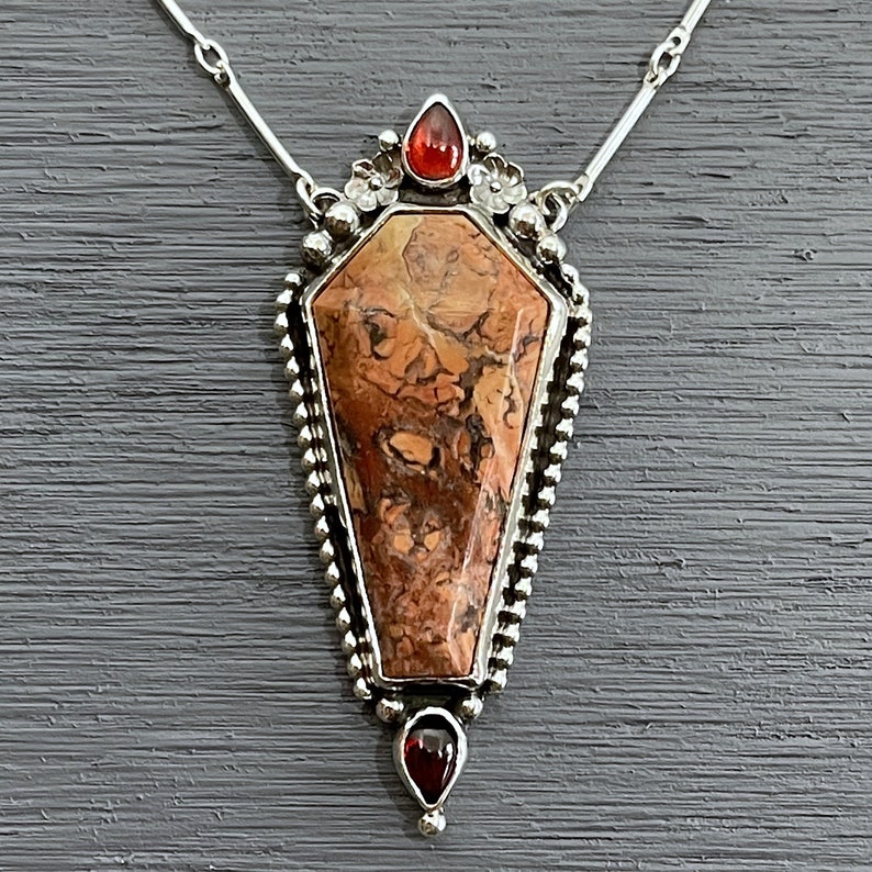 tiffany stone coffin pendant with garnet gemstones