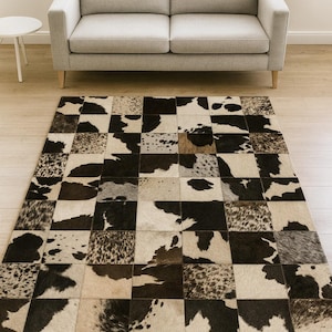 Handmade Black Cowhide Patchwork Rug: Hair-On Leather, Rustic Modern Style