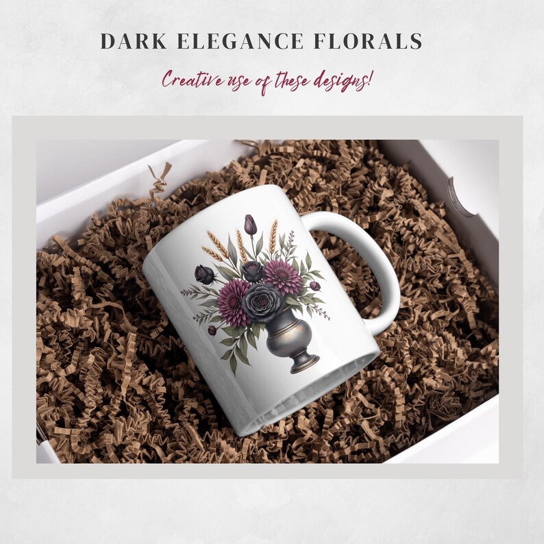 May include: White ceramic mug featuring a floral design with dark purple and gray flowers, wheat stalks, and green leaves. The mug is inside a white box filled with brown shredded paper. The text "DARK ELEGANCE FLORALS" and "Creative use of these designs!" are at the top.