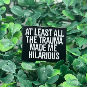 At Least All the Trauma Made Me Funny Enamel Pin – Dark Humor Mental Health Pin for Backpacks, Jackets & Gifts