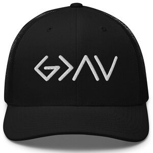 May include: Black trucker hat with a white embroidered design that reads "G>A>V".