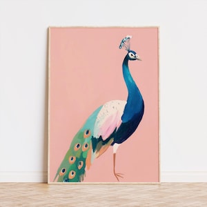 May include: A framed art print featuring a peacock illustration. The peacock has a blue head and neck, a white and pink chest, and a long, green and blue tail with orange accents. The background is a solid light pink color.