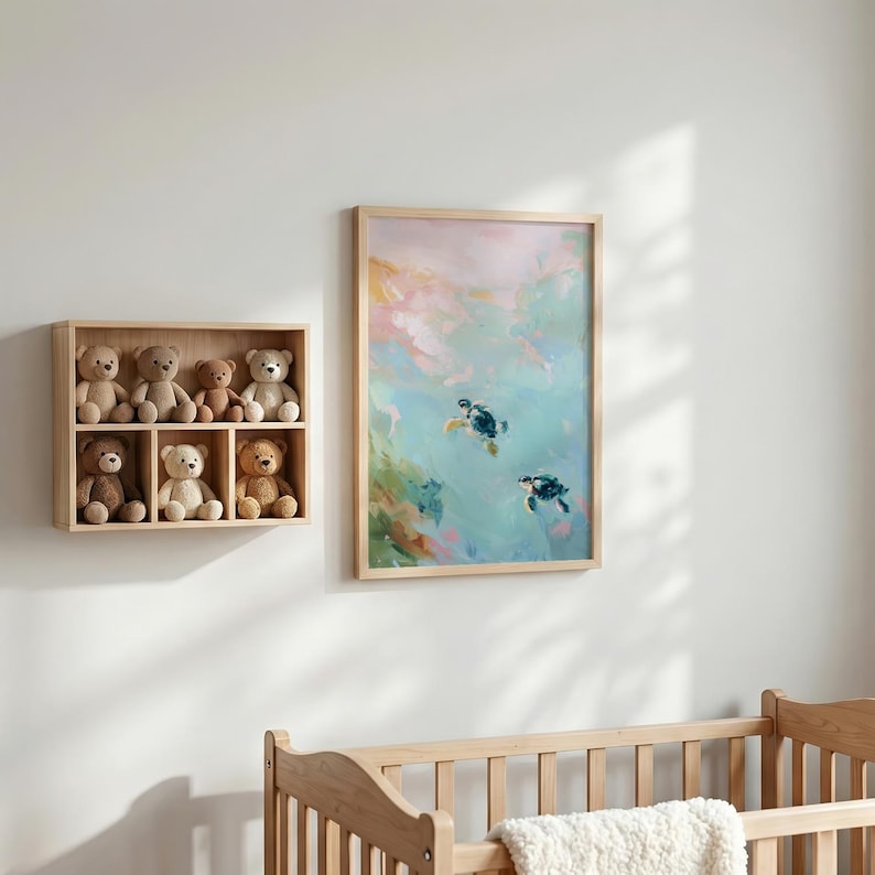 May include: A nursery scene featuring a wooden framed painting of two sea turtles swimming in blue water. A wooden shelf with six teddy bears is mounted on the wall. A wooden crib is in the foreground.