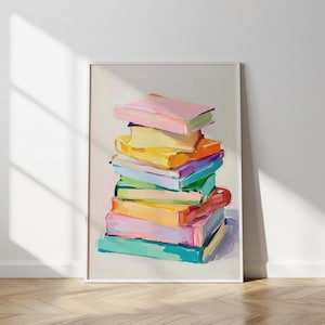 May include: A vertical rectangular art print featuring a stack of books painted with visible brushstrokes. The books are rendered in various colors including pink, yellow, orange, light blue, green, and purple, set against a neutral background.
