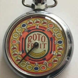 ROTO FRUIT machine gambling pocket watch style game