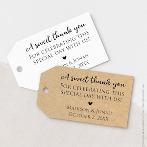 May include: Two rectangular gift tags with rounded corners and a hole punch at the top. One tag is white and the other is light brown kraft paper. Both feature the black printed text A sweet thank you FOR CELEBRATING THIS SPECIAL DAY WITH US!