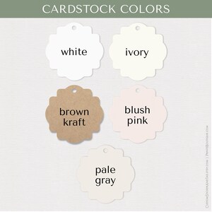 May include: Five scalloped-edge cardstock tags arranged in a grid, labeled with the text CARDSTOCK COLORS. The tags are white, ivory, brown kraft, blush pink, and pale gray. Each tag features a small circular hole at the top for hanging.