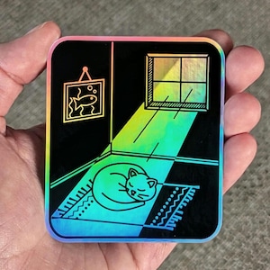 Sticker chat bain de soleil ; Holographique ; Holo ; Chaton endormi au soleil ; Sieste et bains de soleil ; Sticker chaton en vinyle au soleil ; Sticker chat mignon