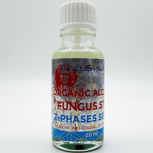 May include: A clear glass bottle with a white cap, containing a light yellow liquid. The label is red, blue, and white with the text "Chillsyner Organic Alcohol Fungus Strain 2+Phases Serum Maximum Herbal Extract 20 ml".